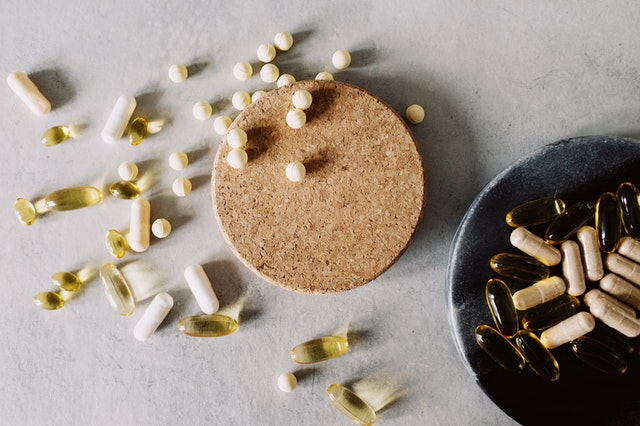 Supplements sprawled out on a table