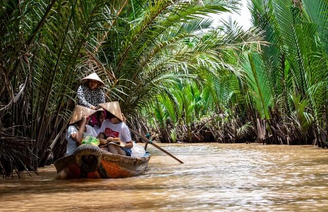 People in South-East Asia traveling using a boat